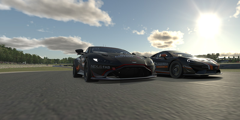 Racing 1 Aston Martin GT4 and McLaren GT4 cars battling on track with the bright sun in the background.