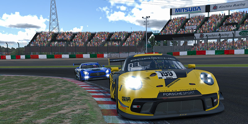 Racing 3 A Porsche GT3 leading a Mercedes GT3 though turn one at Suzuka